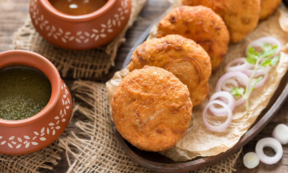 Crispy golden kachoris with chutney